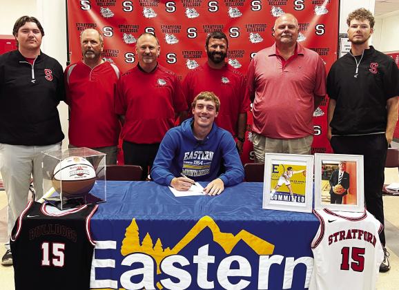 Stratford senior Walker Chandler recently signed a letter of intent to play basketball at Eastern Oklahoma State College in Wilburton. Chandler averaged 21.2 PPG and was voted Quad-County All Conference MVP. Chandler is pictured with his coaches (left to right): Jake Foster, Tony Prichard, Michael Blackburn, Ray Ardery, James Martin and Matthew Warren. Courtesy photo