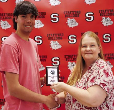 Maddox Smithwick receives his January student of the month award from Linda Grigg of BancFirst, Stratford student of the month sponsor. Courtesy photo