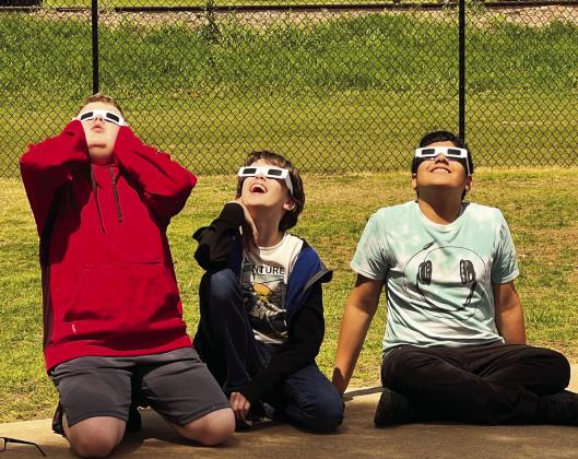 These Pauls Valley Intermediate School students had the opportunity to don their eclipse glasses and watch with their classmates from the school’s playground. 